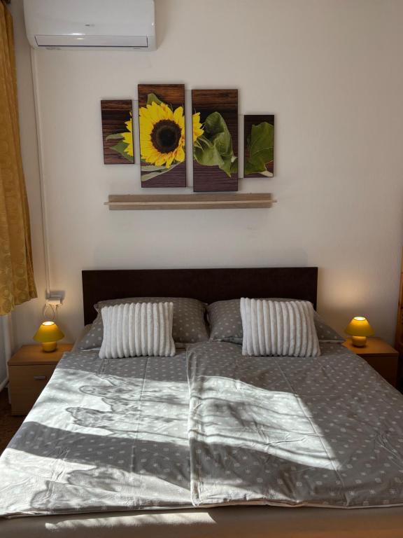 Postel nebo postele na pokoji v ubytování Apartmanovy dom Grand