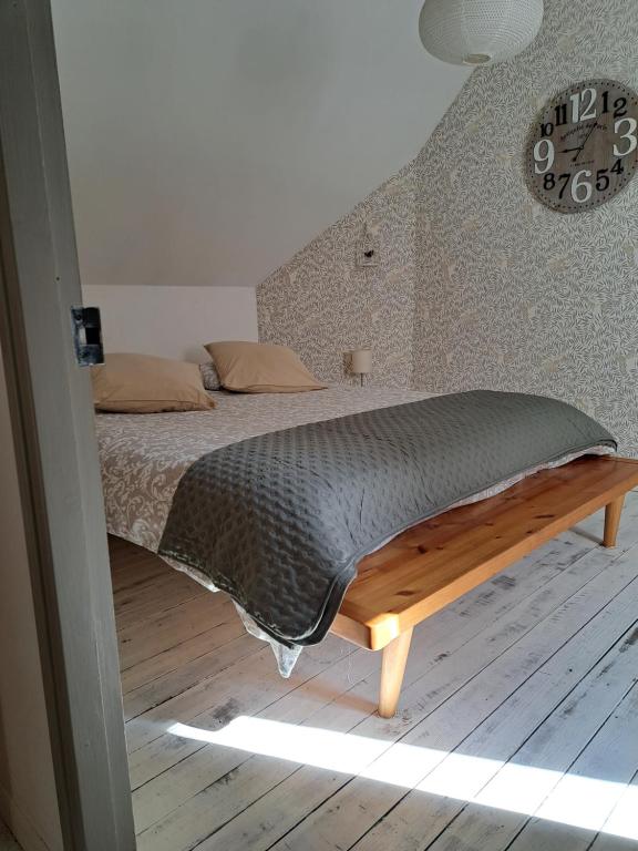 Postel nebo postele na pokoji v ubytování Gîte de la Belle Roze