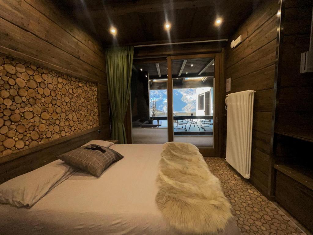 Letto o letti in una camera di Best House snc di Elisa Baroni e Beatrice Dei Cas