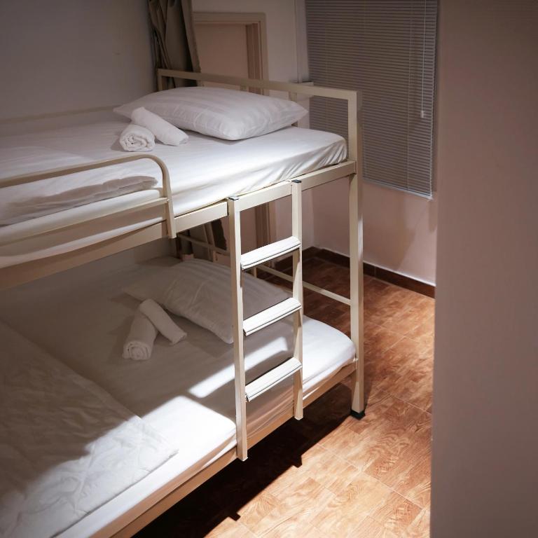 Voodi või voodid majutusasutuse BenHouse the Dorm toas