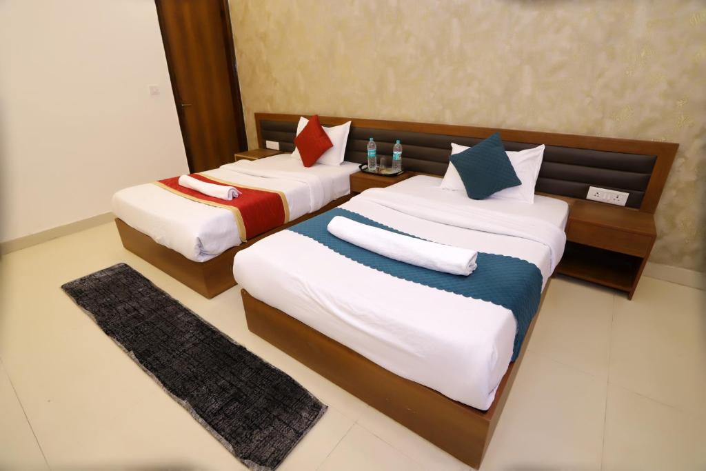 Postel nebo postele na pokoji v ubytování Hotel Luxe Stay Near Delhi Airport