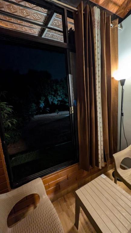 Balkón nebo terasa v ubytování Eeshaavasya Homestay