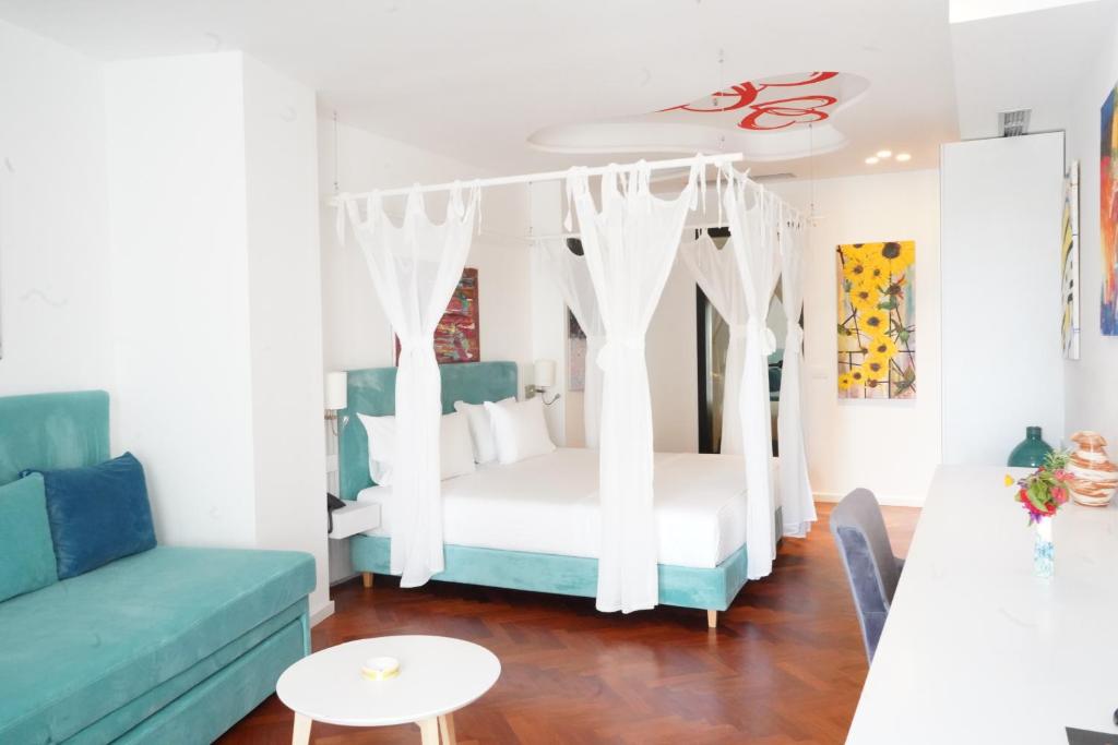 Postel nebo postele na pokoji v ubytování Bougainville Bay Hotel