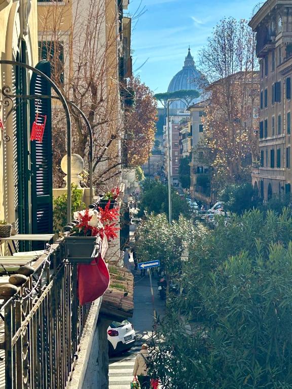 a balcony with a view of a city with a building at Big Johnny B in Rome