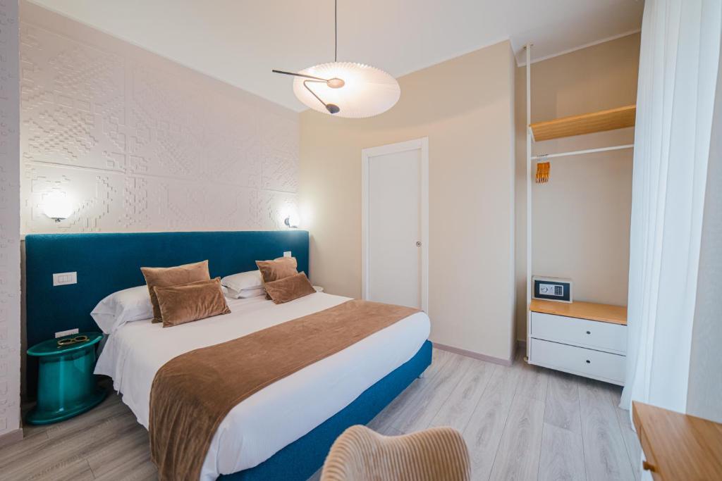 Postel nebo postele na pokoji v ubytování A'Coffa Rooms