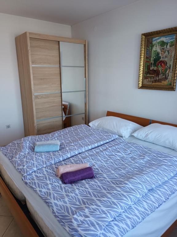 Posteľ alebo postele v izbe v ubytovaní Vuke Apartments