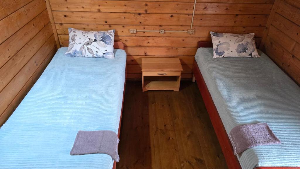 Postel nebo postele na pokoji v ubytování Olga's Home