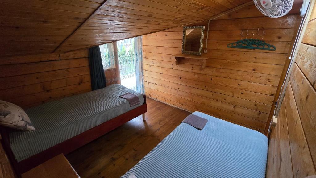 Postel nebo postele na pokoji v ubytování Olga's Home