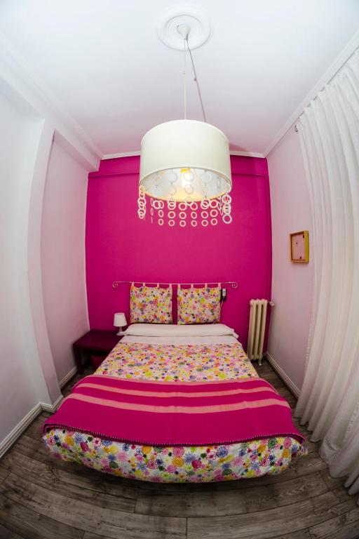 Cama o camas de una habitación en Pensión Blanca B&B