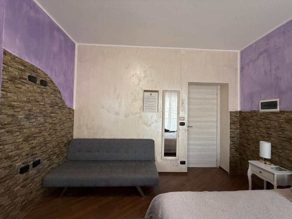 Postel nebo postele na pokoji v ubytování Acqua Azzurra