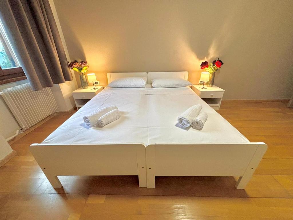 Postel nebo postele na pokoji v ubytování Hotel Pietralba