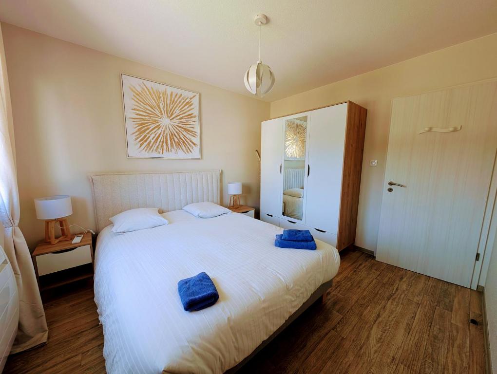 Postel nebo postele na pokoji v ubytování Alsace Appartements Meyer-Krumb