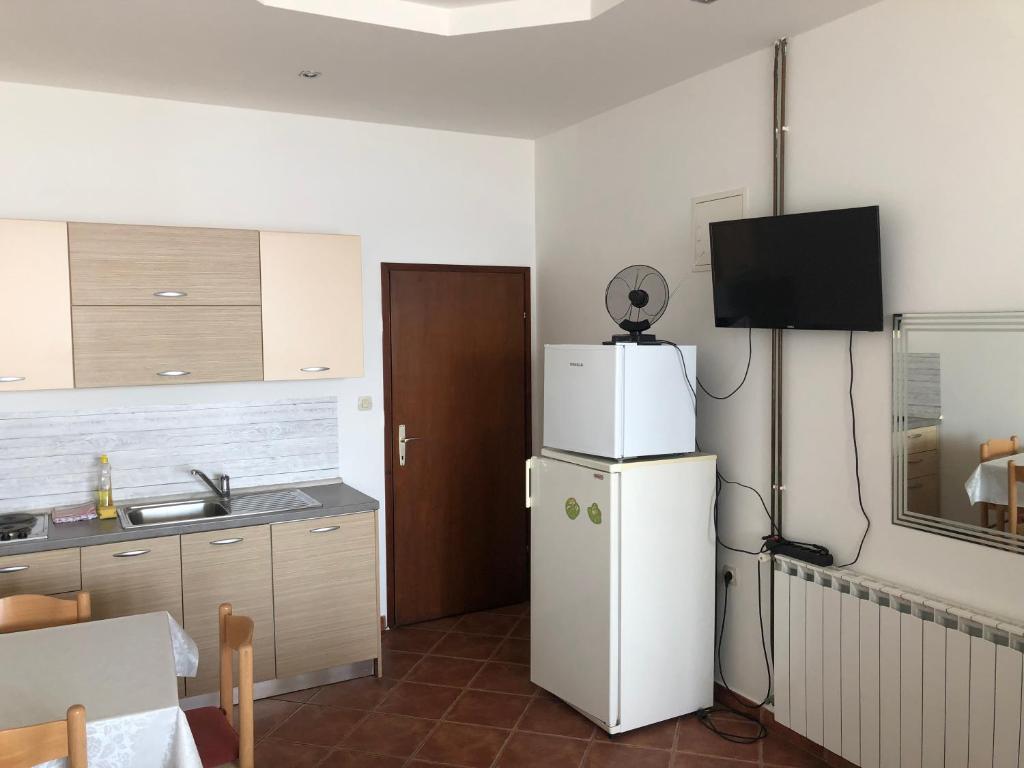 Kuchyňa alebo kuchynka v ubytovaní Vuke Apartments