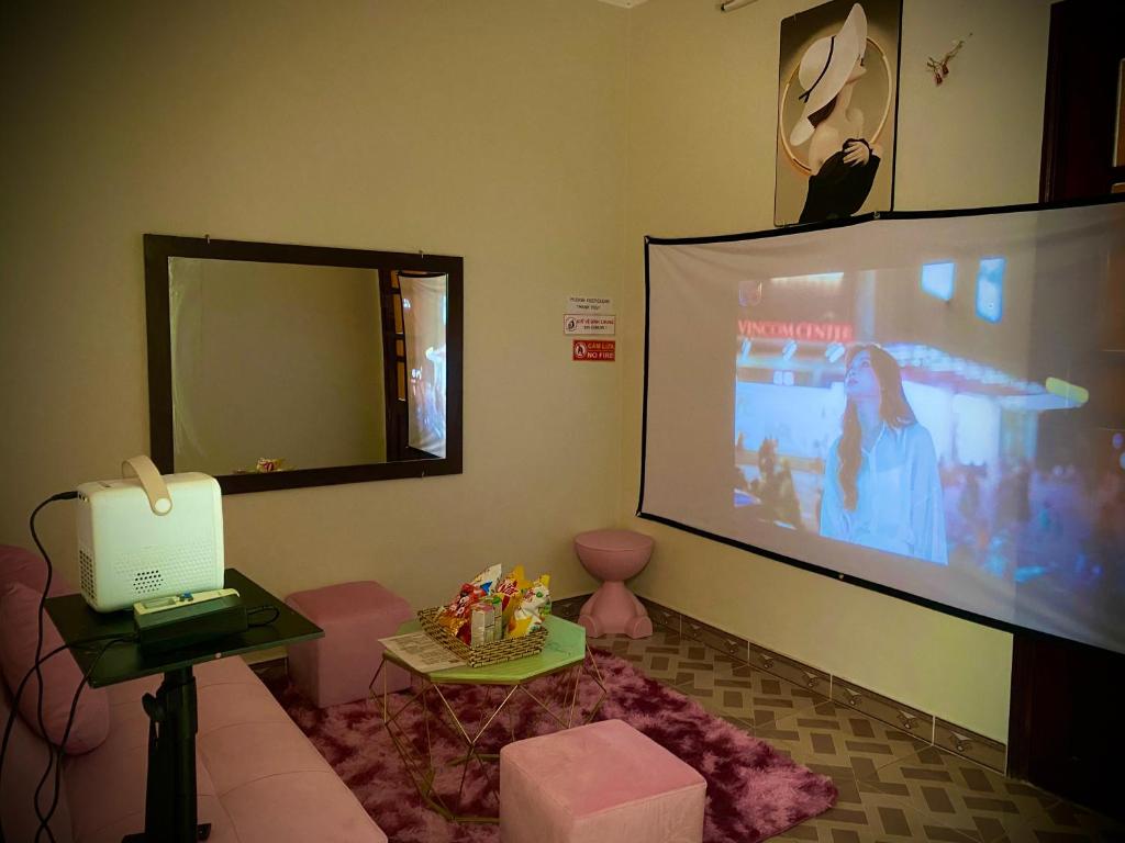 TV a/nebo společenská místnost v ubytování DK House Homestay