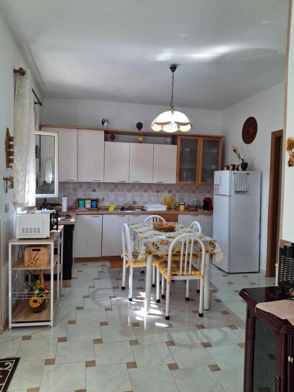Kuchyň nebo kuchyňský kout v ubytování Villa Rosetta vacanze al mare