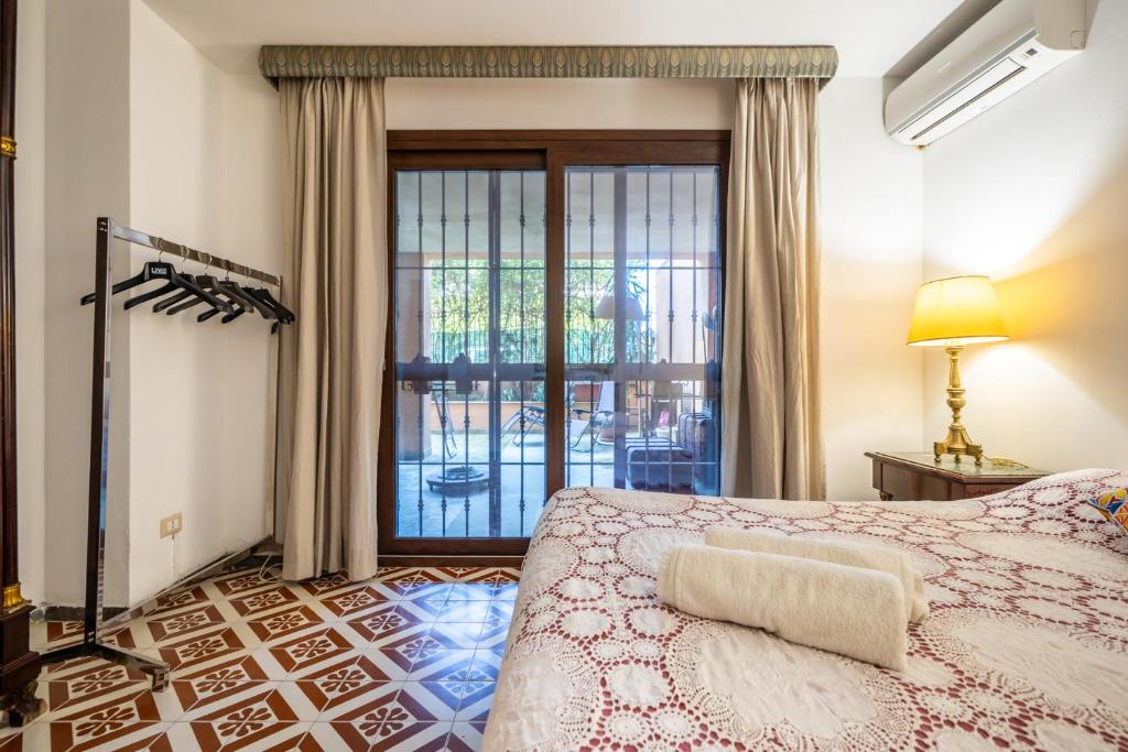 Letto o letti in una camera di A pochi passi dal mare