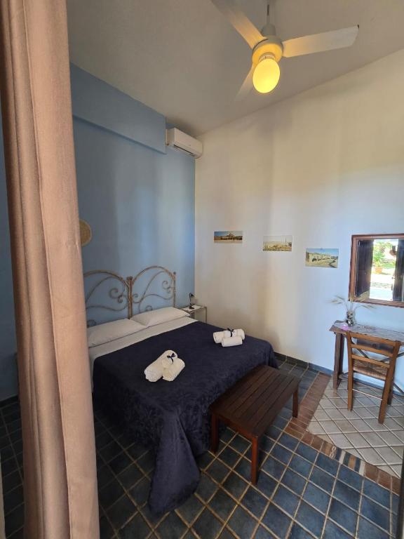Posteľ alebo postele v izbe v ubytovaní B&B Casa Cavarra