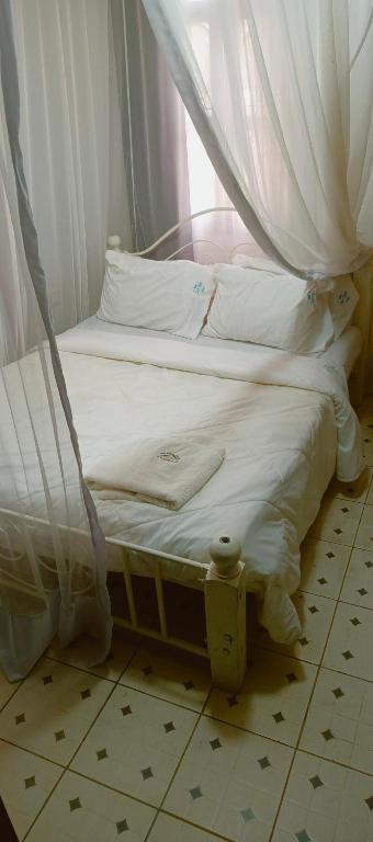 Postel nebo postele na pokoji v ubytování MELVIC INN