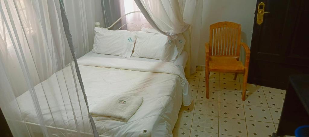 Postel nebo postele na pokoji v ubytování MELVIC INN