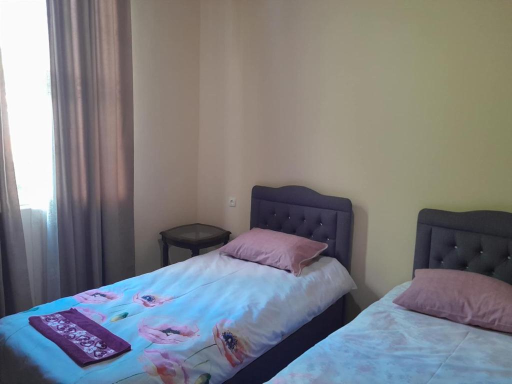 Postel nebo postele na pokoji v ubytování BaBa guesthouse