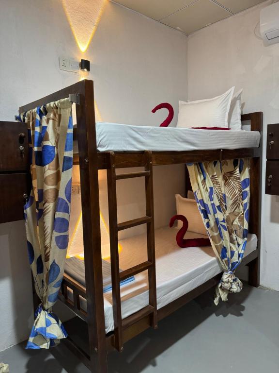 Postel nebo postele na pokoji v ubytování Moonlight surf hostel