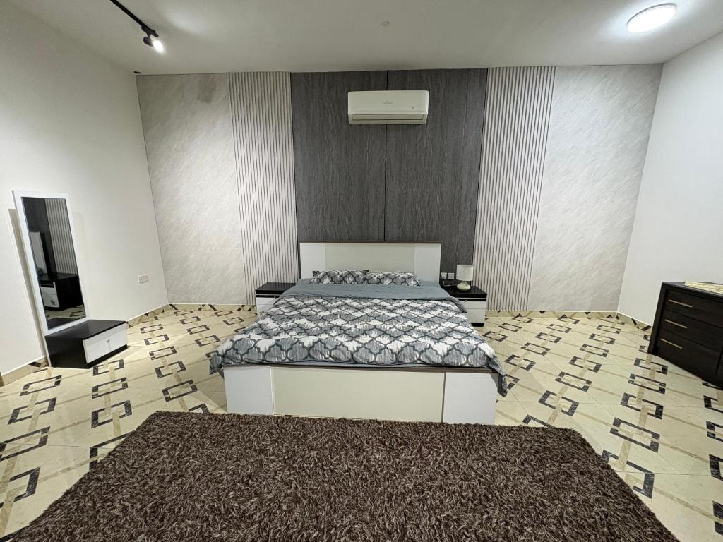 Postel nebo postele na pokoji v ubytování AlZaeem Resort & Hotels