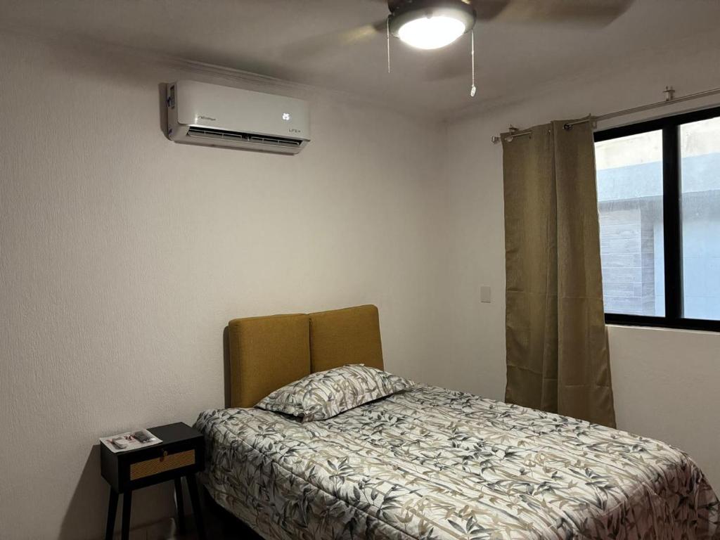Postel nebo postele na pokoji v ubytování Casa Marea a una cuadra del mar