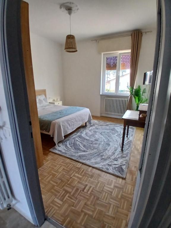 Postel nebo postele na pokoji v ubytování Il terrazzo dei 3
