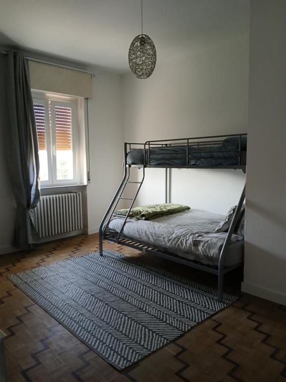 Postel nebo postele na pokoji v ubytování Il terrazzo dei 3