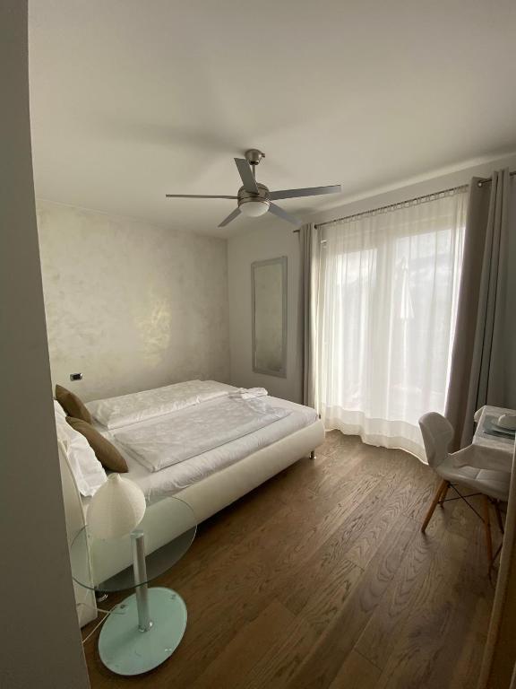 Postel nebo postele na pokoji v ubytování B&B Mele d'Oro