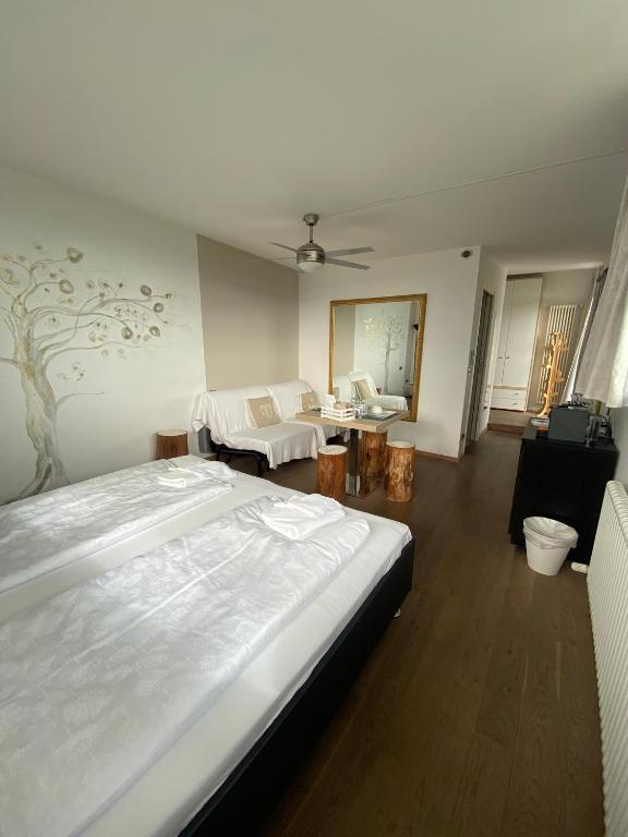 Postel nebo postele na pokoji v ubytování B&B Mele d'Oro