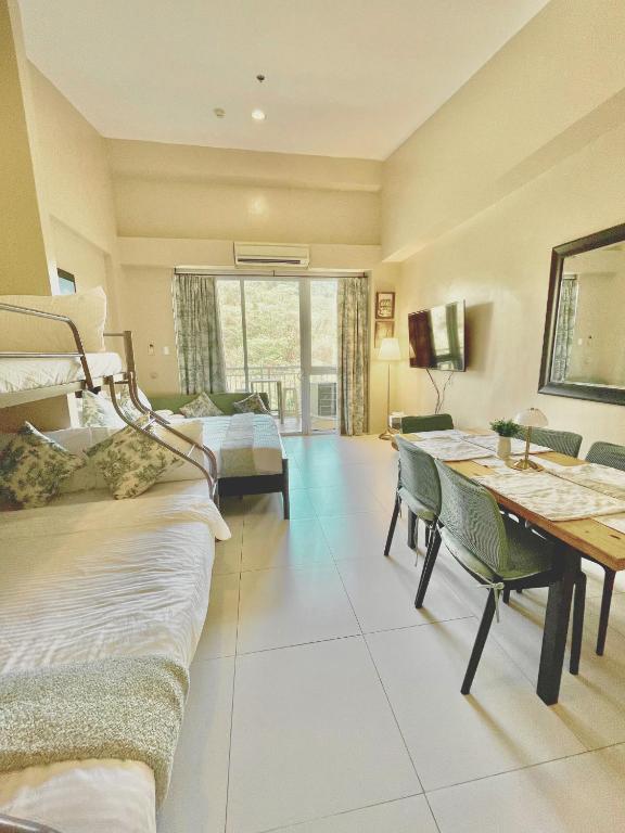 Posezení v ubytování Nade Suites - Pico De Loro MIA 609