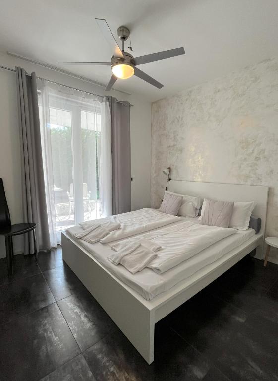 Postel nebo postele na pokoji v ubytování B&B Mele d'Oro