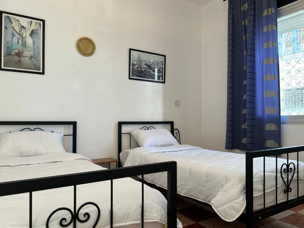 Letto o letti in una camera di Hotel Al Manar