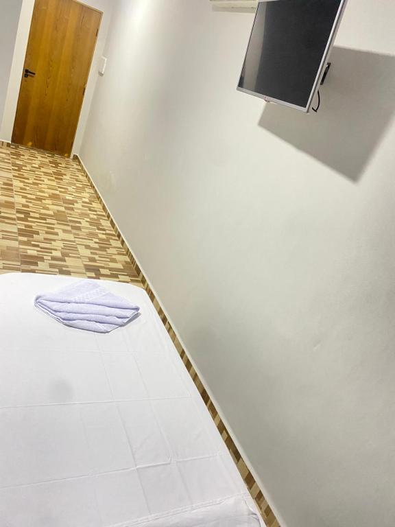 Postel nebo postele na pokoji v ubytování Pousada Sagrada Devoção