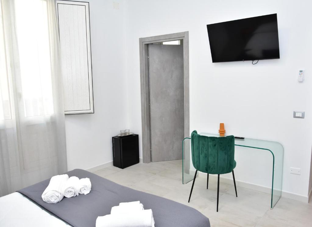 TV a/nebo společenská místnost v ubytování Yllen Rooms