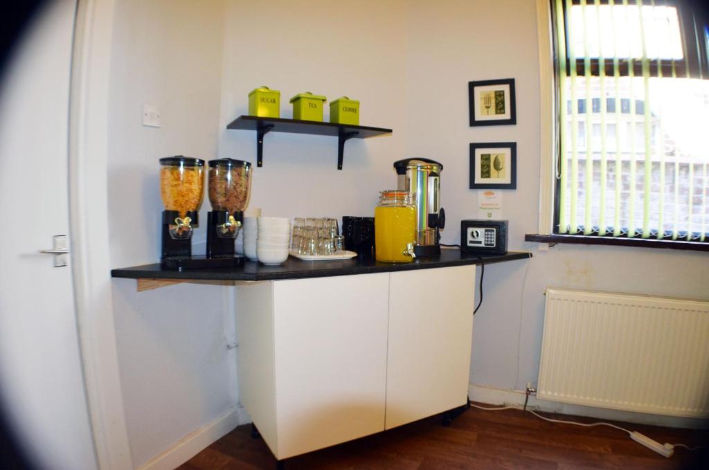 Kuchyň nebo kuchyňský kout v ubytování Birchfields Guest House