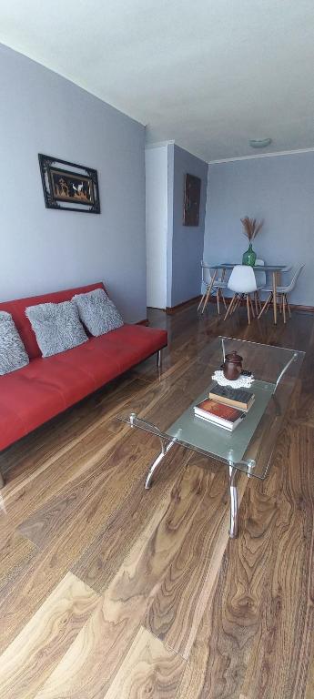 Posezení v ubytování Cómodo y acogedor departamento 2D1B
