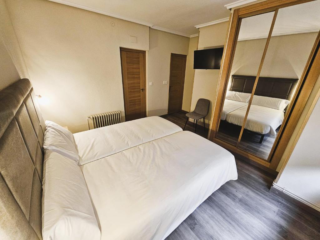 Postel nebo postele na pokoji v ubytování El Campillo