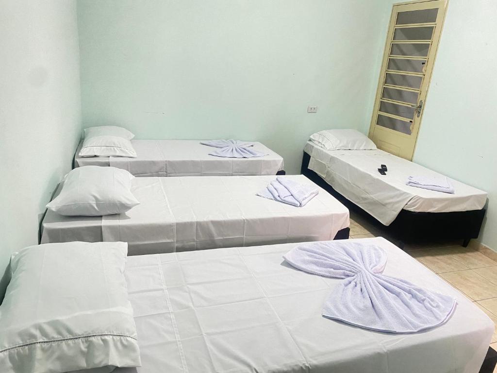Postel nebo postele na pokoji v ubytování Pousada Sagrada Devoção