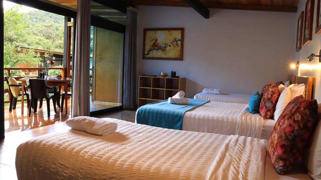 Postel nebo postele na pokoji v ubytování Las Terrazas de Dana Boutique Lodge & Spa