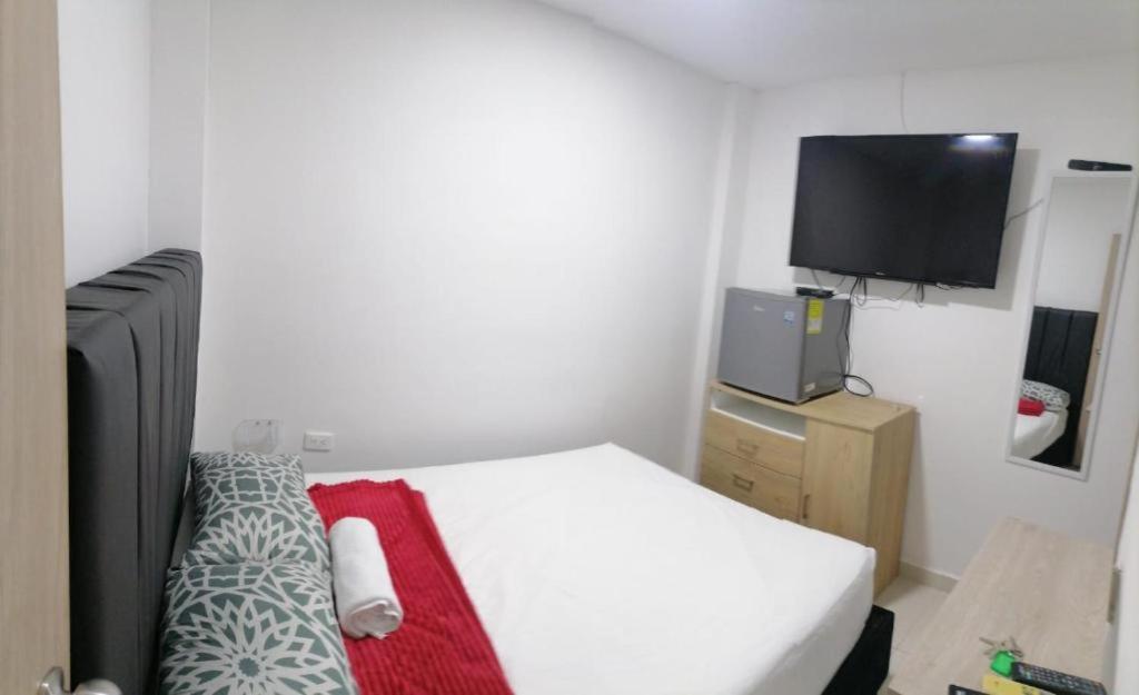 Televiisor ja/või meelelahutuskeskus majutusasutuses Hostel AC