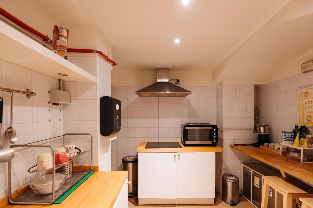 Kuchyň nebo kuchyňský kout v ubytování Tomato Urban Retreat