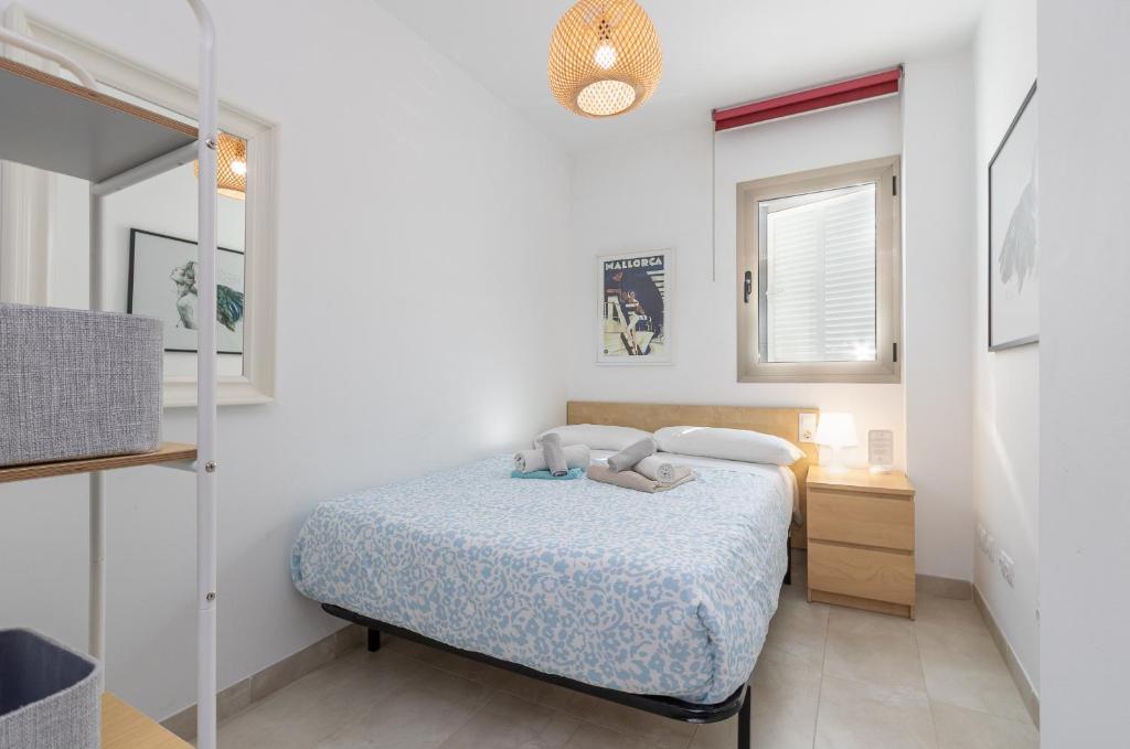A bed or beds in a room at Adosado Bellavista B By homevillas360