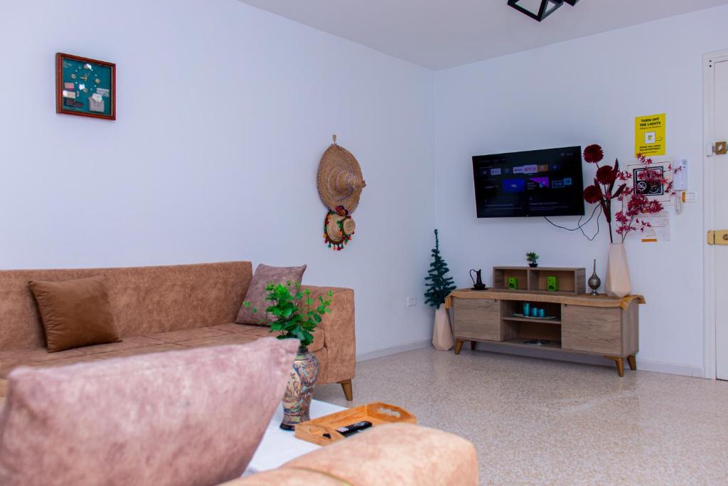 TV a/nebo společenská místnost v ubytování Le Rooftop Apparte - Barbecue, Grande Terrasse