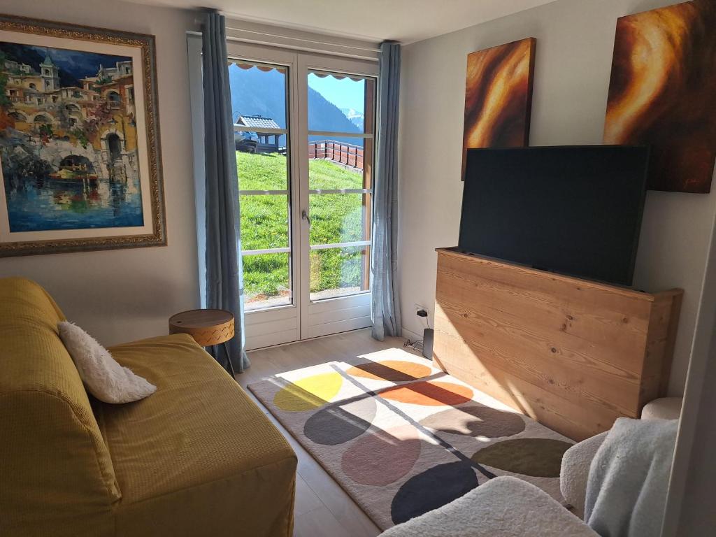 Posezení v ubytování Alpine ski apartment - Petit Châtel