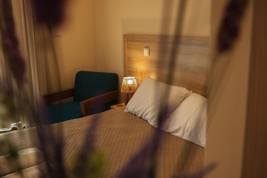 Postel nebo postele na pokoji v ubytování Vina Oliva Resort