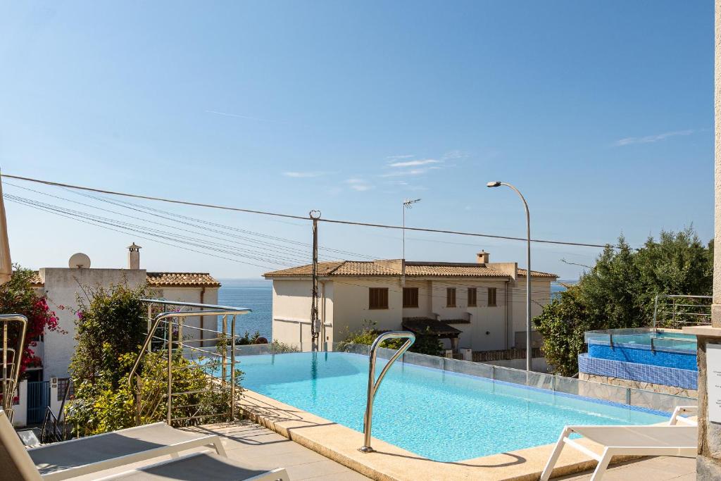 The swimming pool at or close to Adosado Bellavista B By homevillas360