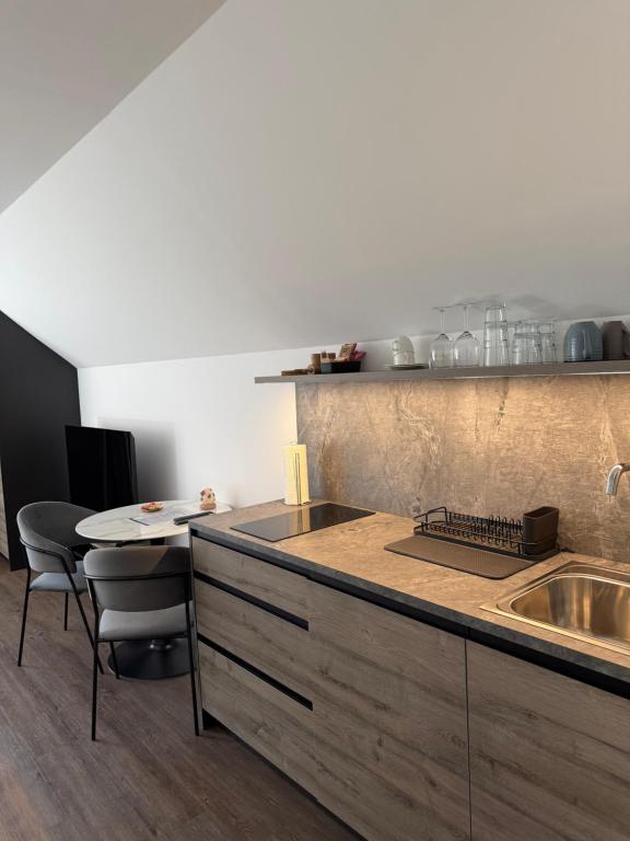 Kuchyň nebo kuchyňský kout v ubytování 4 Elements Resort Bled