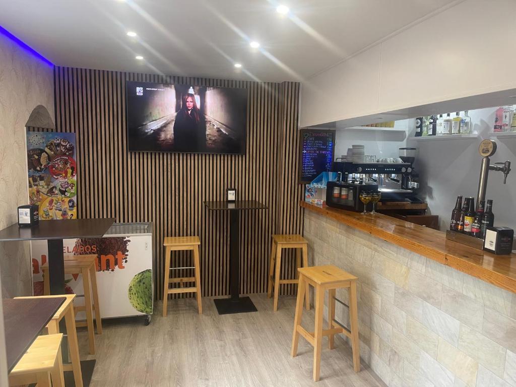 The lounge or bar area at Hotel Azcona